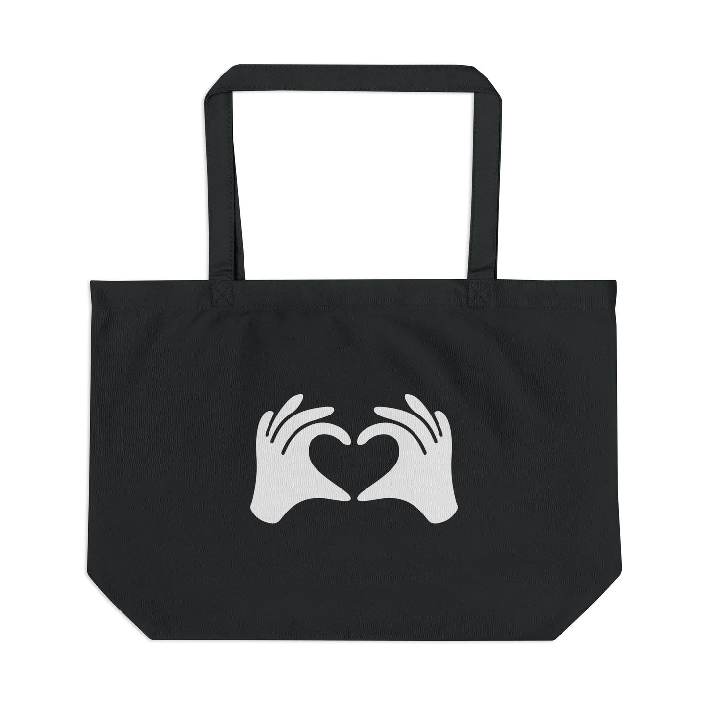 Black tote bag with white hands forming a heart design on a white background