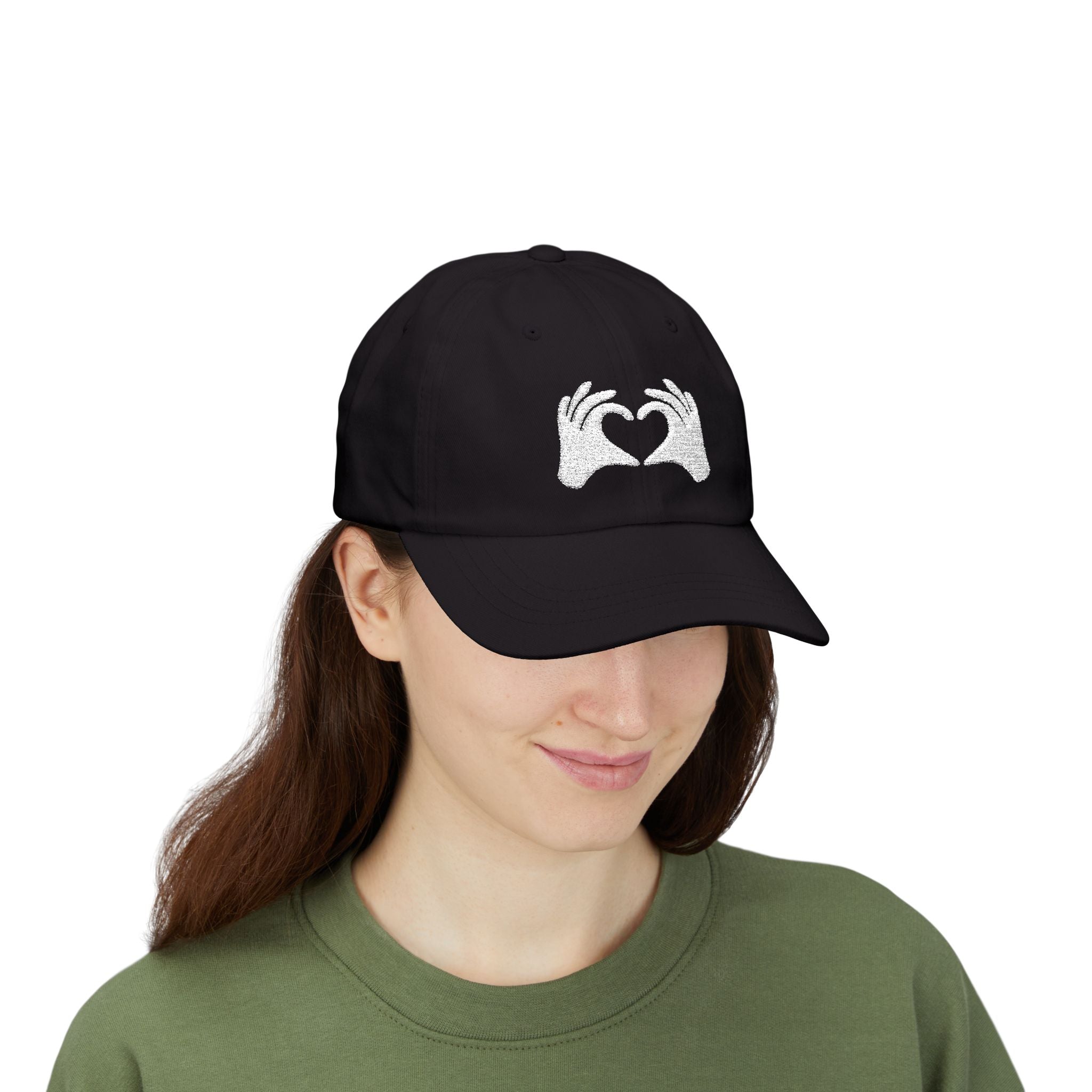 Person wearing a black cap with 'RAISING LEGENDS' text on a white background