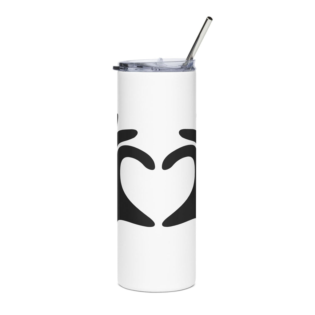 White tumbler with black heart design and metal straw on a white background