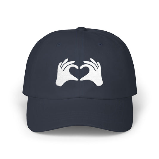 Navy blue cap with a green and white logo on a white background
