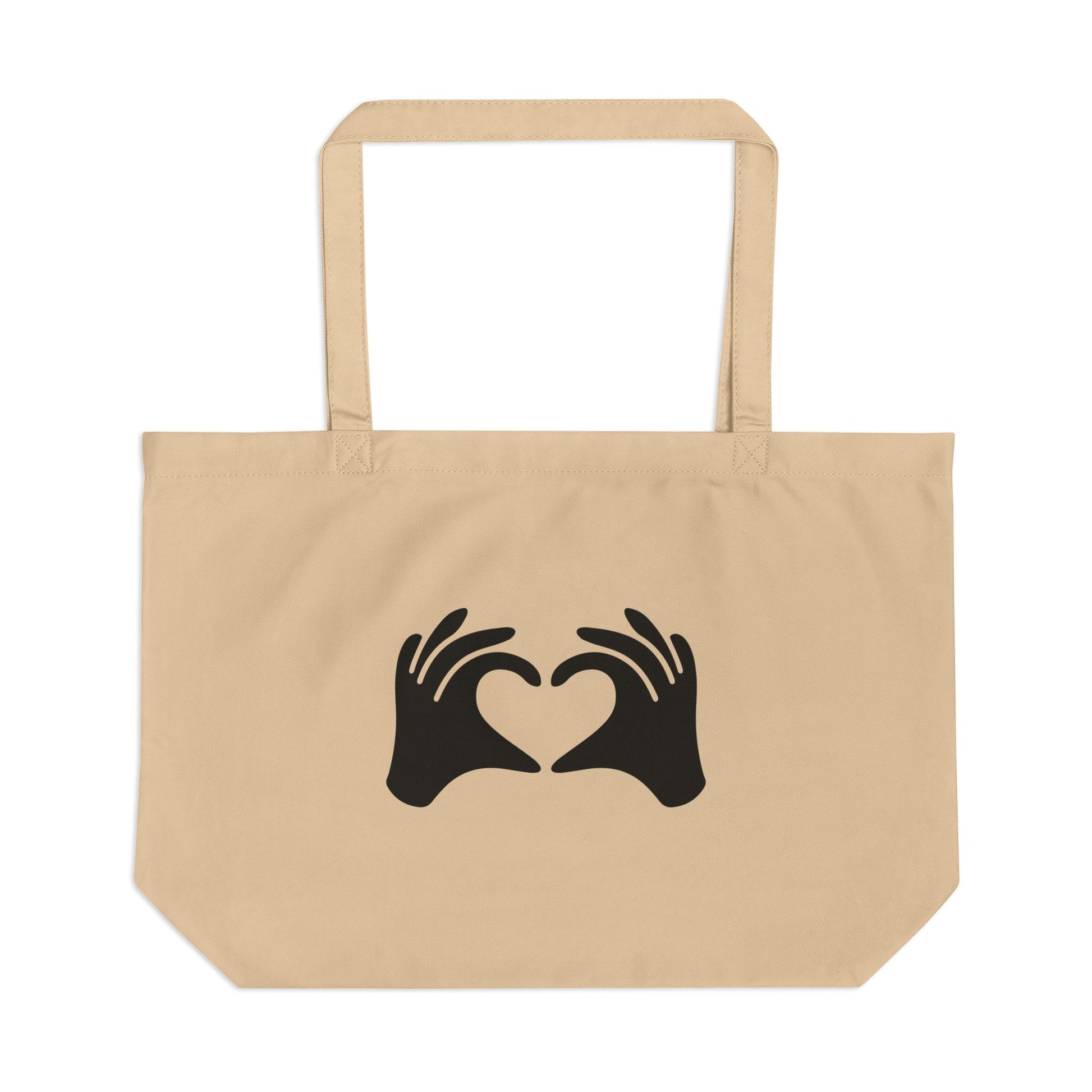Beige tote bag with black hand heart design on a white background