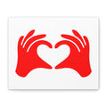 Red hands forming a heart shape on a white background
