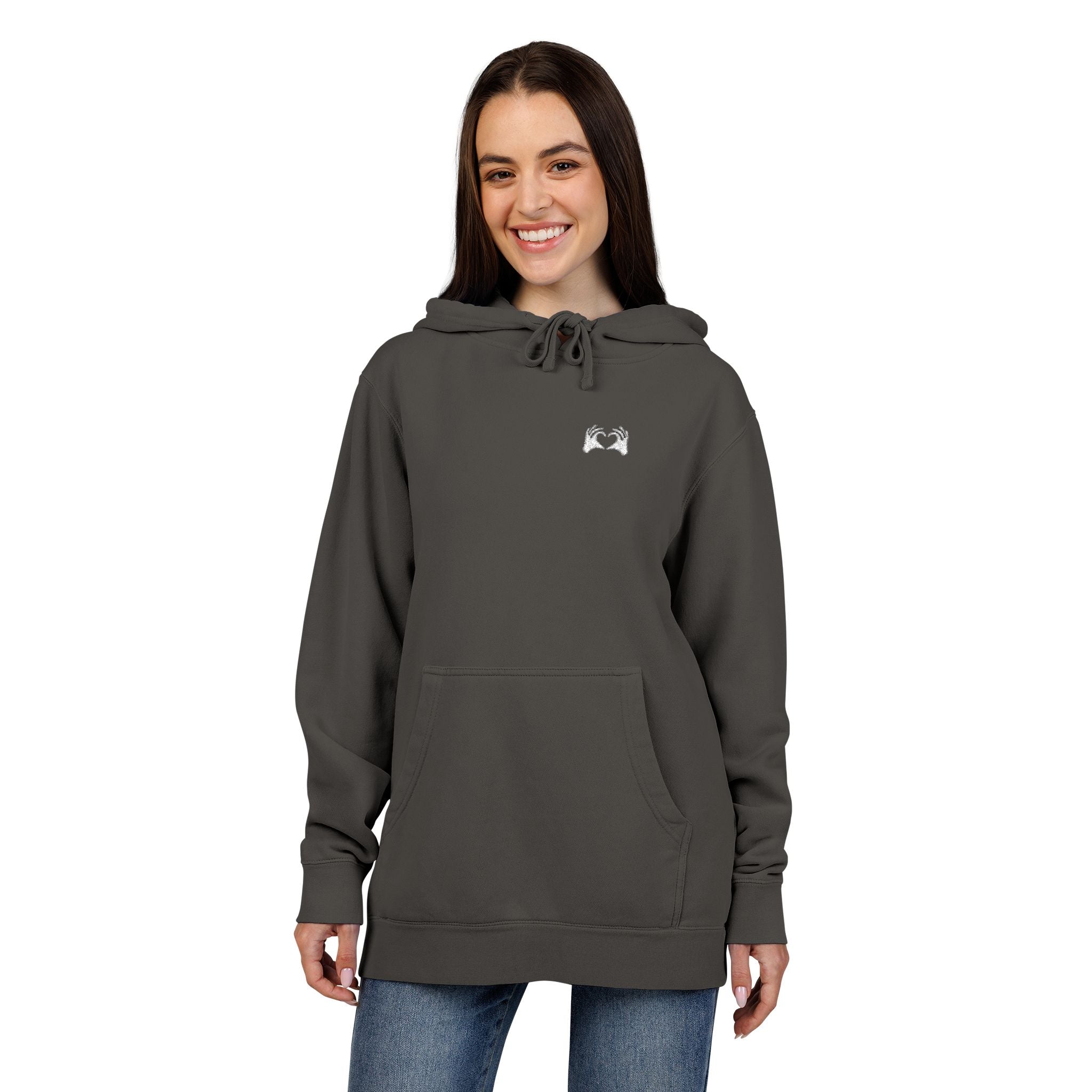 Woman wearing a gray hoodie with text on a white background