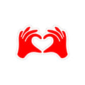 Red hands forming a heart shape on a white background