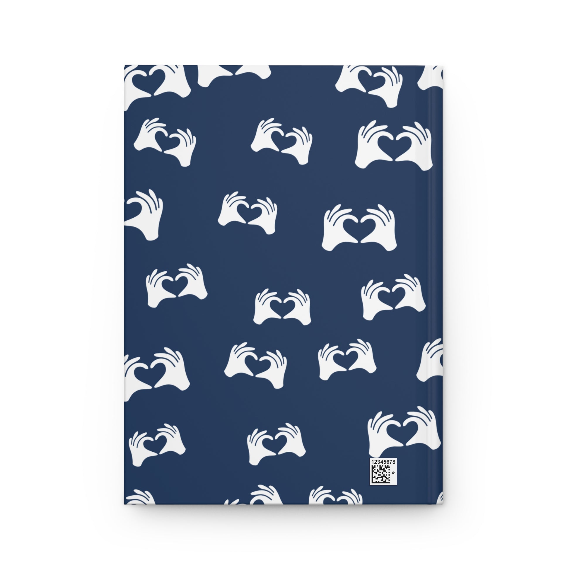 Notebook with white hand heart pattern on a blue background