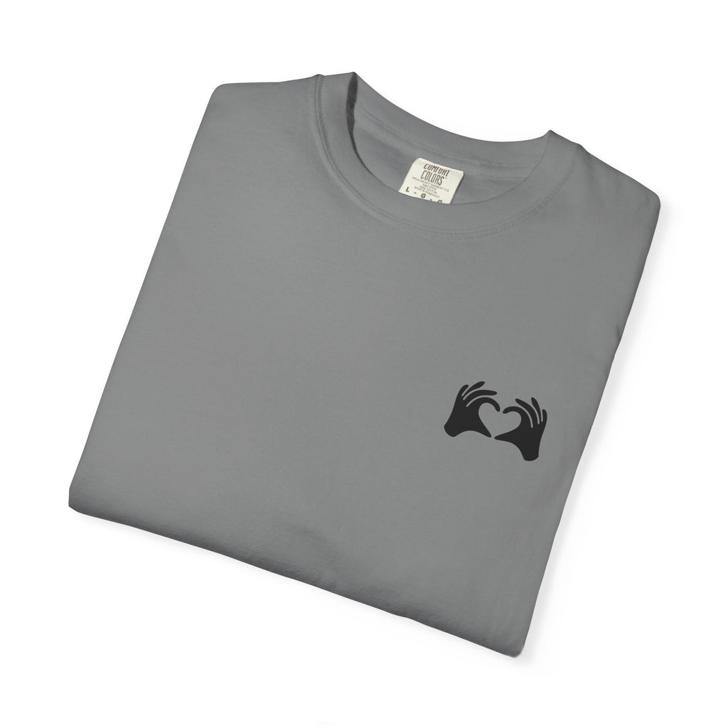 Folded gray t-shirt with a black geometric design on a white background