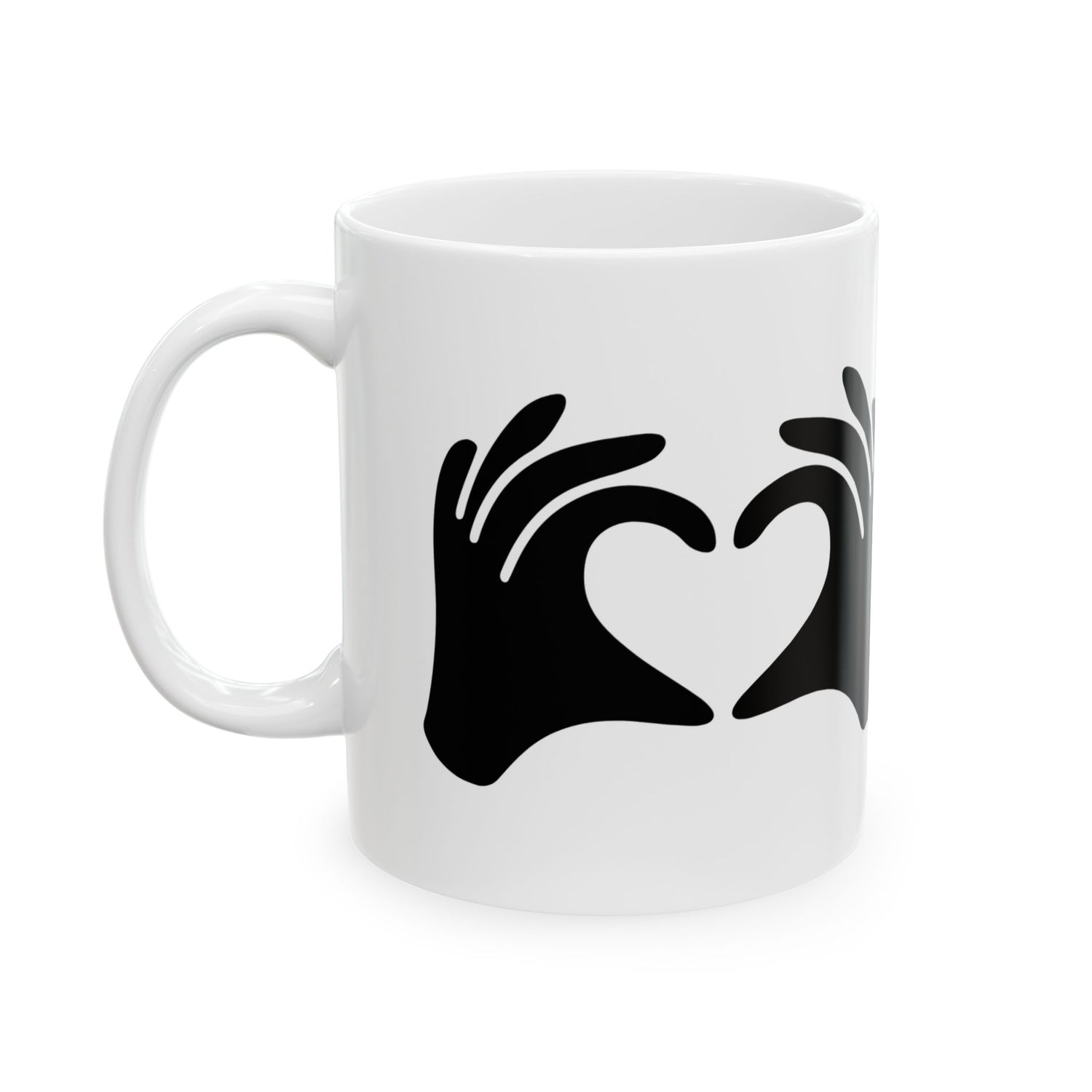 White mug with black hand-shaped heart design on a white background
