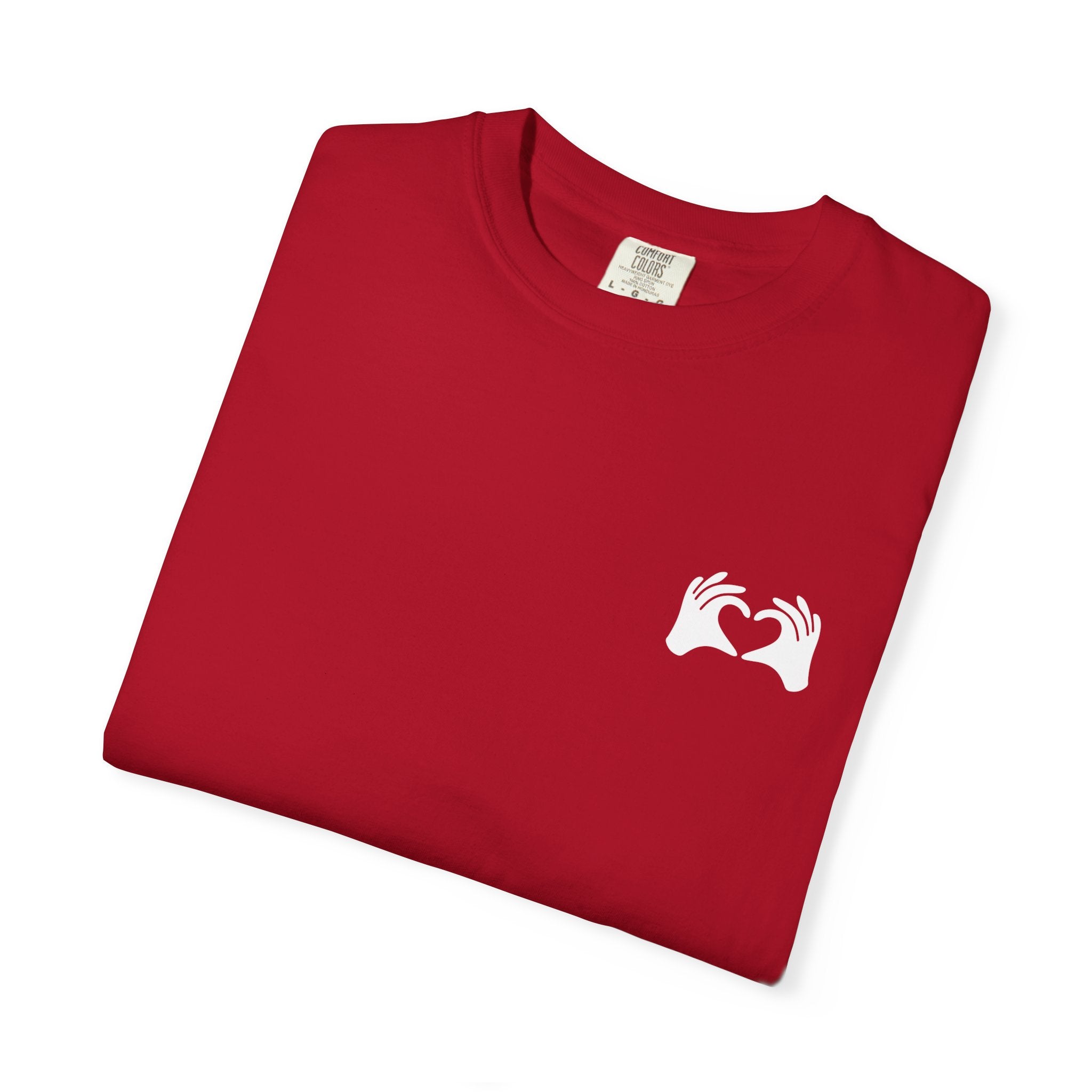 Folded brown t-shirt with 'NO RUSH' text in blue on a white background