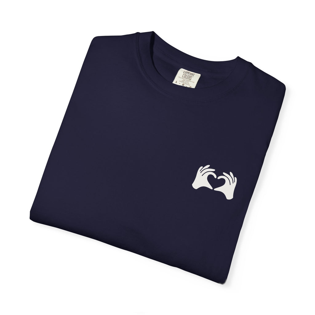 Black t-shirt with 'Sheepdog' logo on a white background