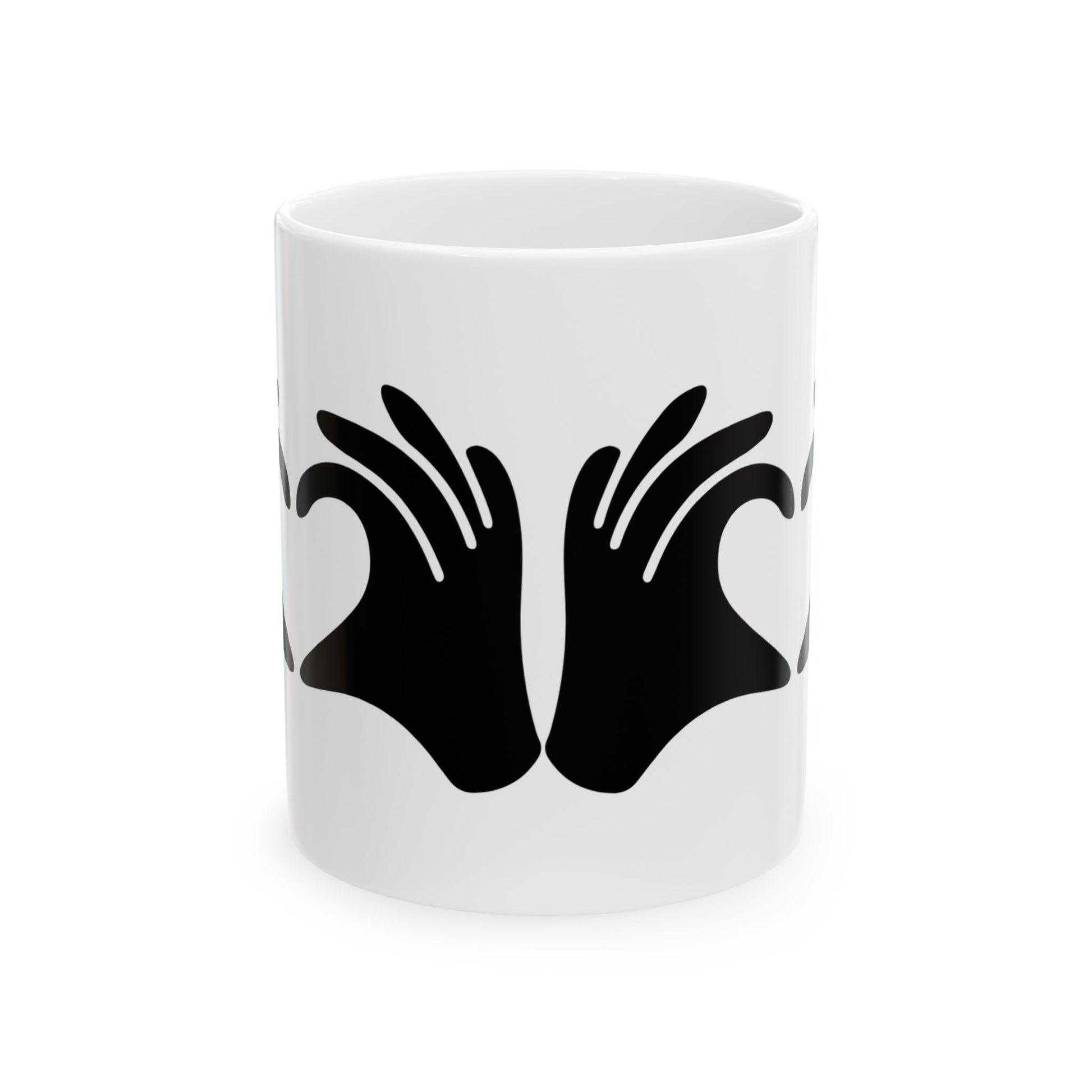 White mug with black hand design on a white background