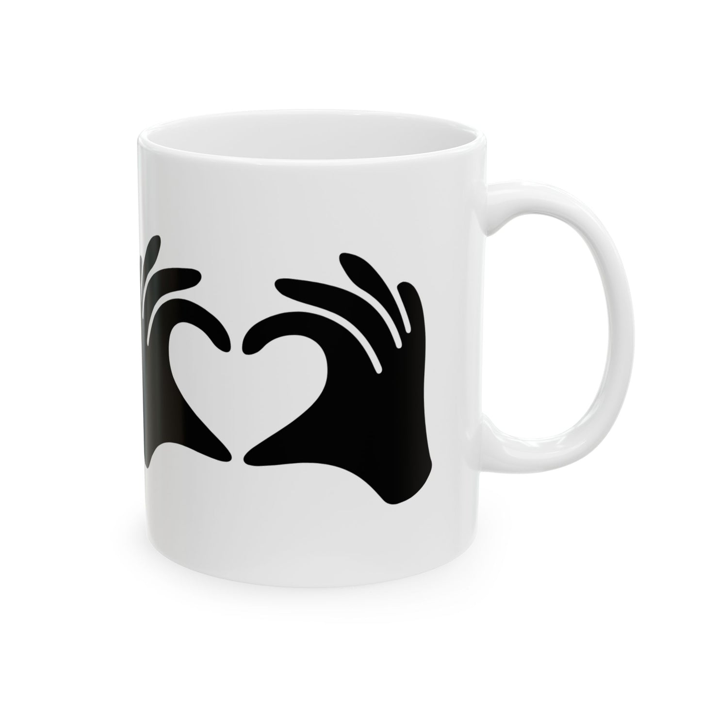 White mug with black heart design on a white background