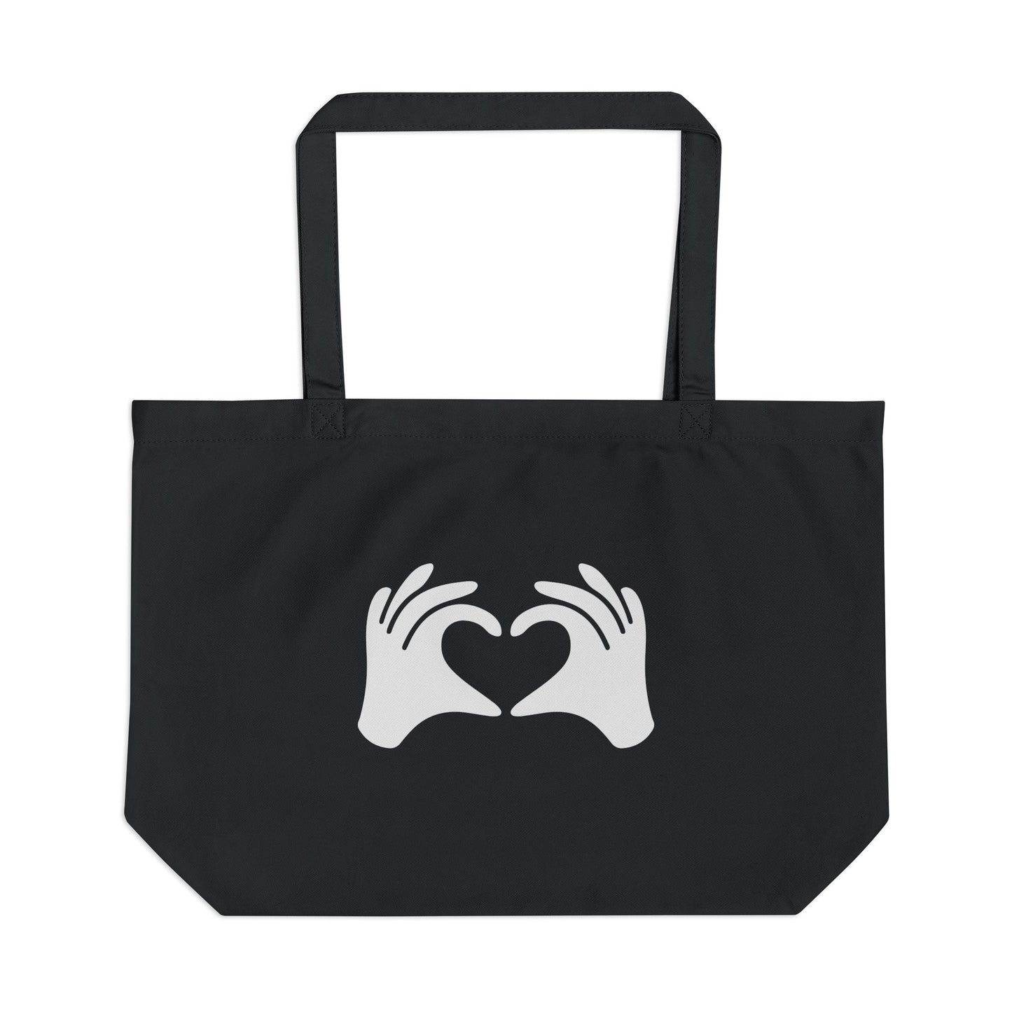 Black tote bag with white hands forming a heart design on a white background