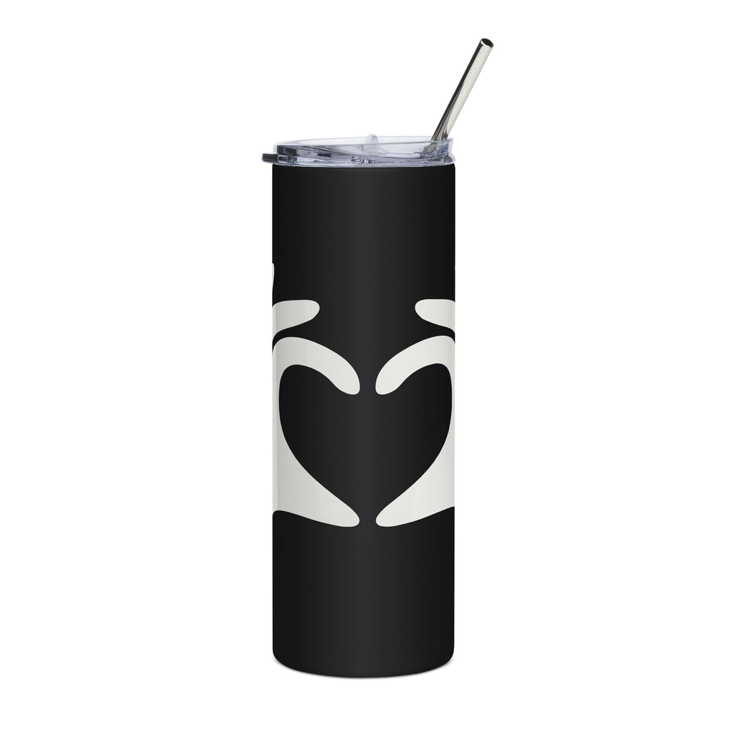 Black tumbler with white heart design and silver straw on a white background