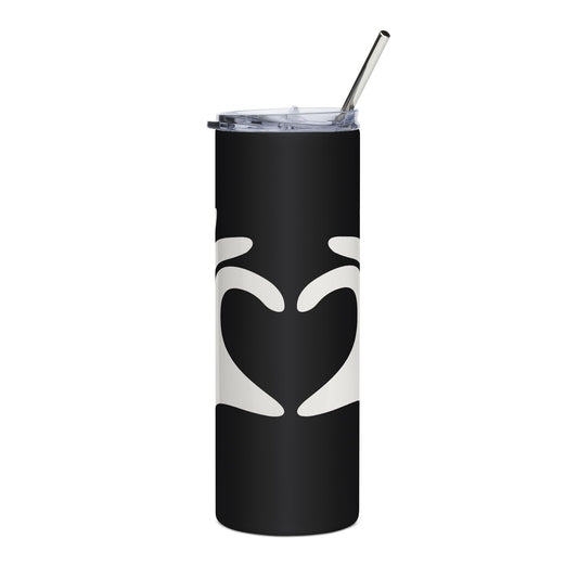 Black tumbler with white heart design and silver straw on a white background