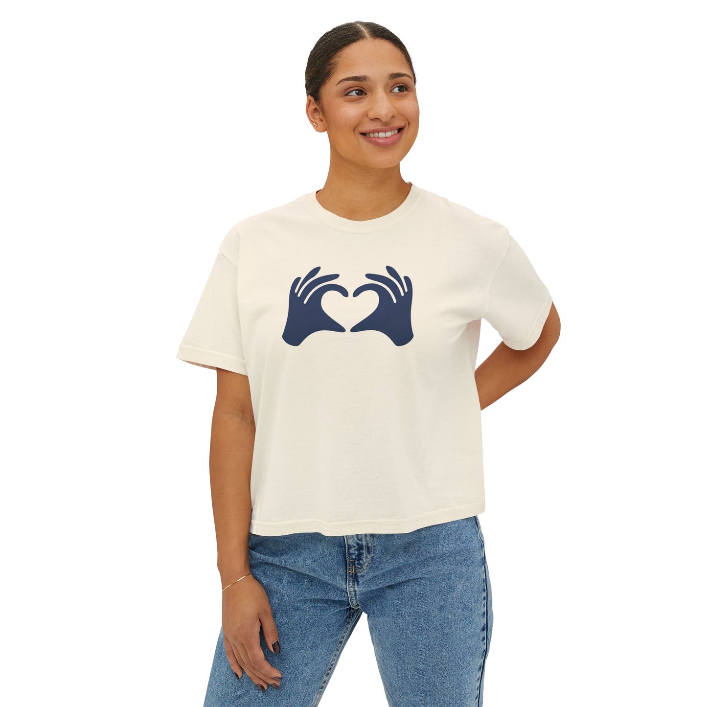 Woman wearing a white t-shirt with a black graphic design on a white background