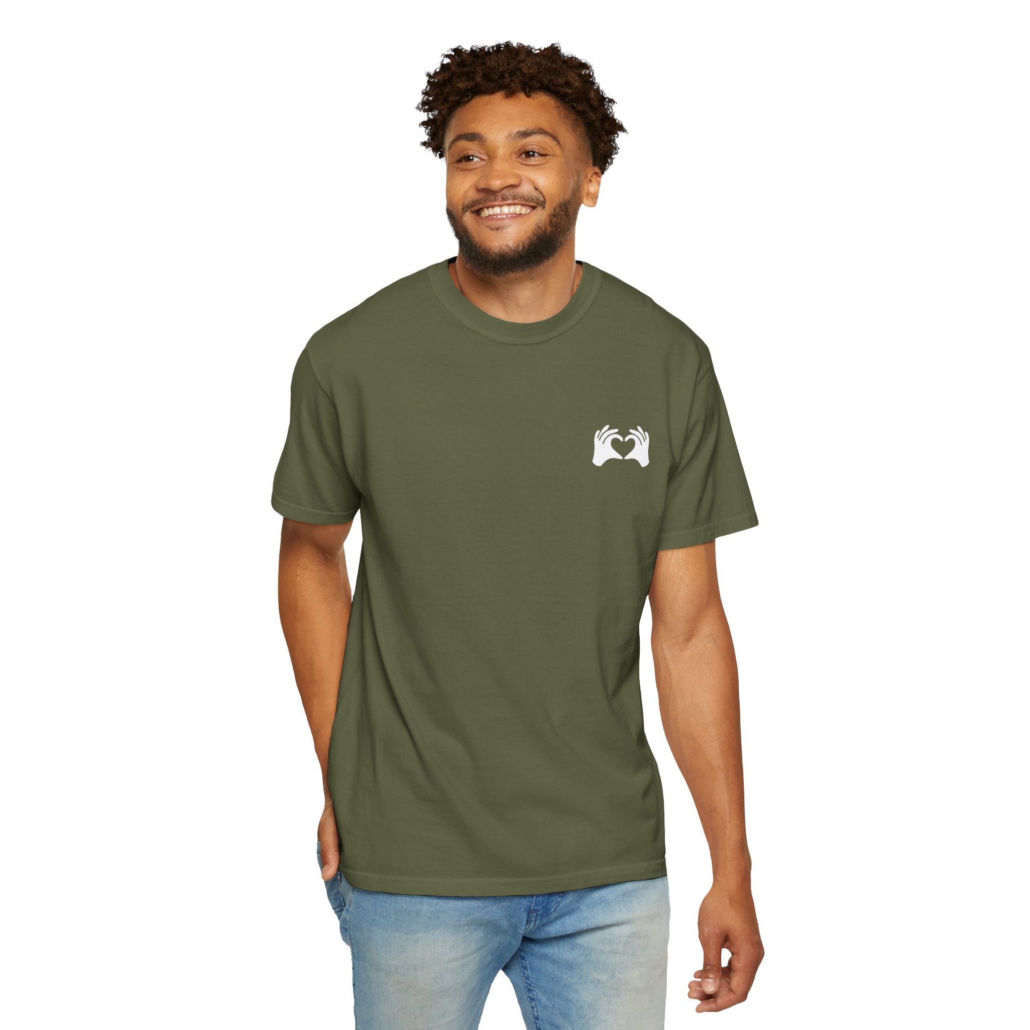Man wearing a gray t-shirt with a logo on a white background